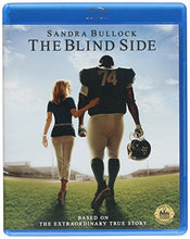 Load image into Gallery viewer, The Blind Side movie cover featuring Sandra Bullock and Quinton Aaron walking across a football field.