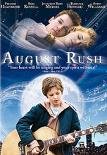Load image into Gallery viewer, August Rush DVD Case Art Featuring Freddie Highmore Playing Guitar Under a Large Moon with the New York City Skyline at the Bottom